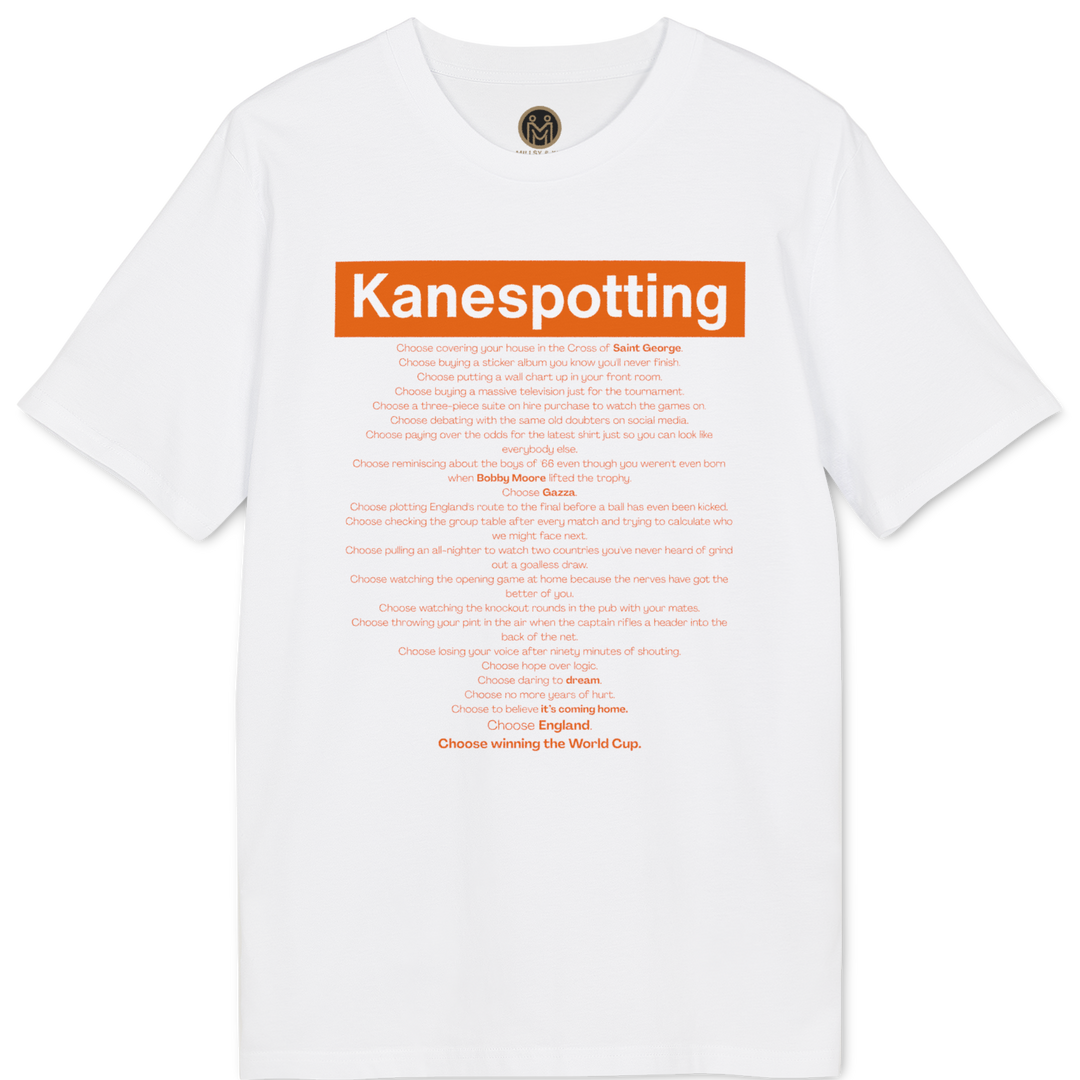 A white short-sleeve crewneck t-shirt featuring a graphic print on the front. The design includes a prominent orange rectangular block with the word 'Kanespotting' in white, followed by several paragraphs of smaller orange text below it, and a small circular black-and-white logo printed inside the collar.