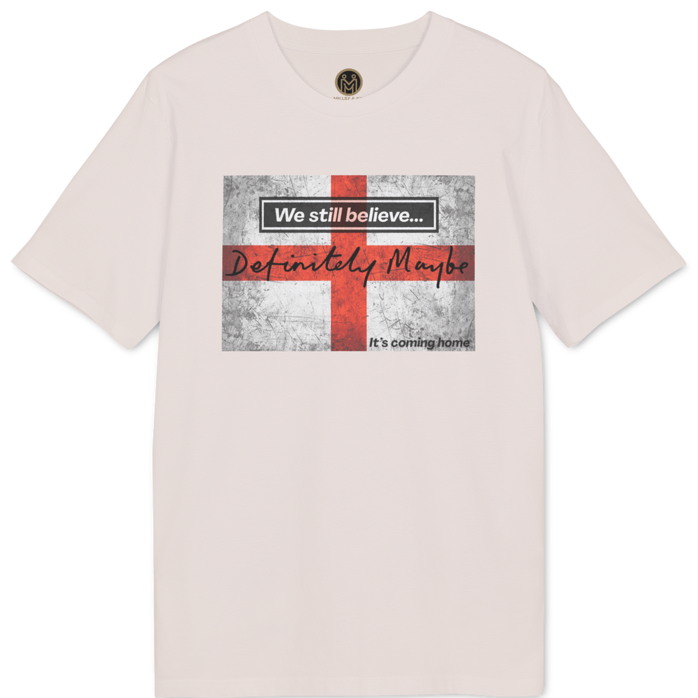 A light pink short-sleeve t-shirt with a graphic on the chest featuring a distressed red and white cross and the text 'We still believe.