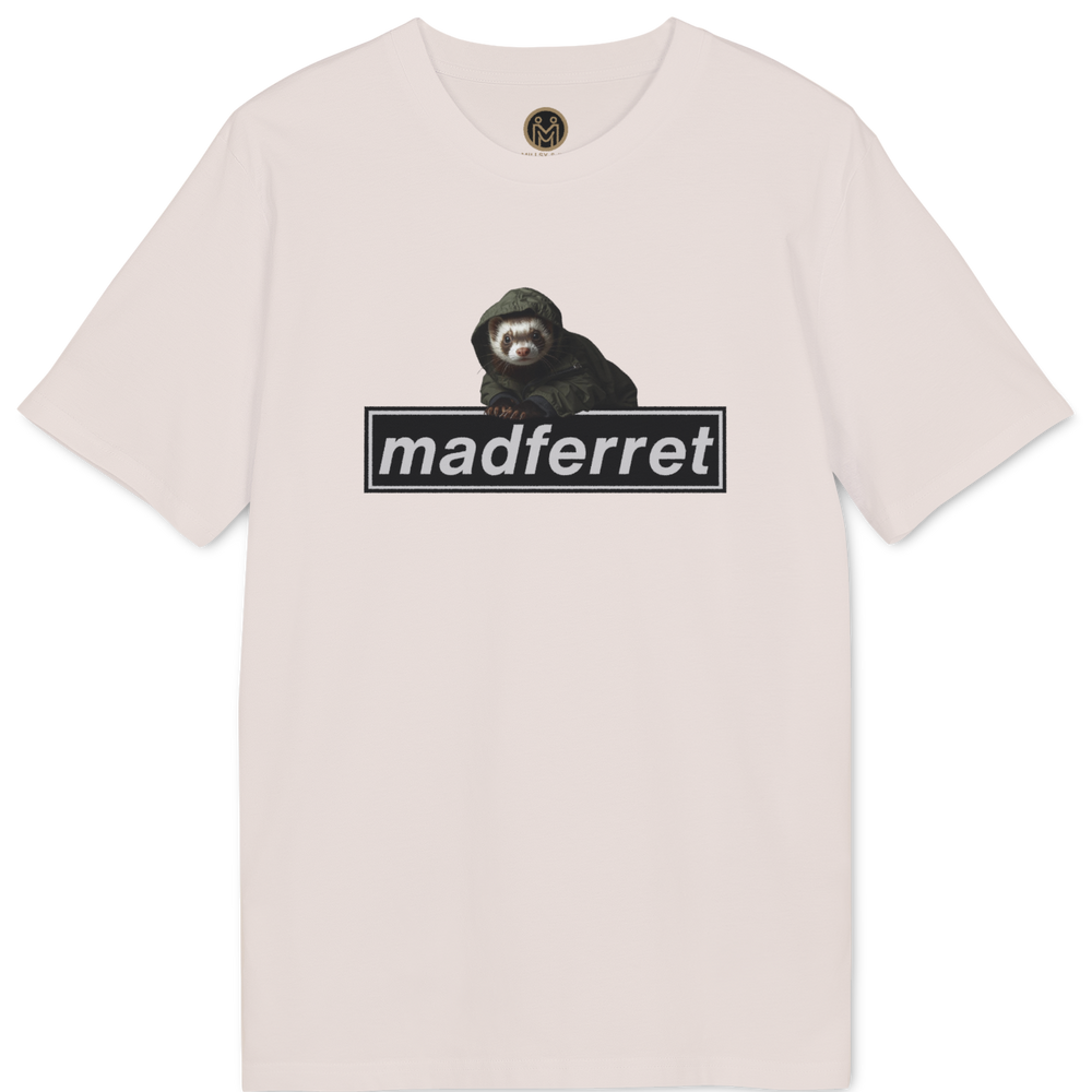 A light pink short-sleeve t-shirt with a graphic of a black monkey sitting above a black bar containing the text 'madferret' in white. The shirt is displayed flat against a solid white background.