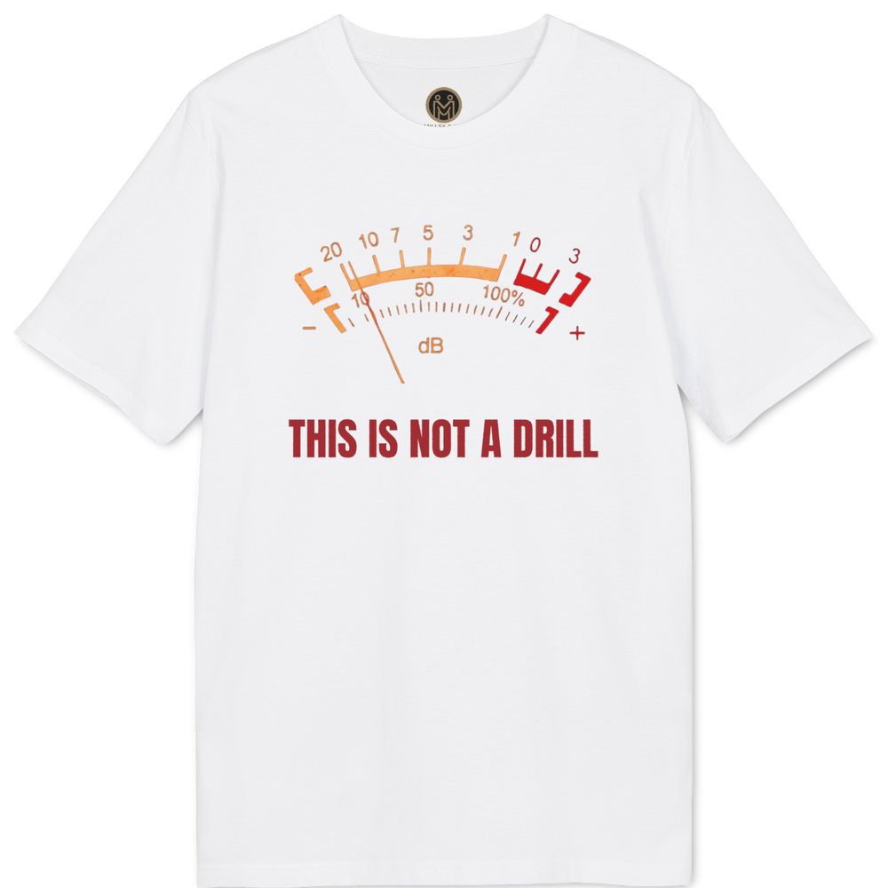 A white short-sleeve t-shirt with a graphic print of an analog needle gauge in orange and red, with the text 'THIS IS NOT A DRILL' printed in red below it. The shirt is displayed flat against a solid white background.