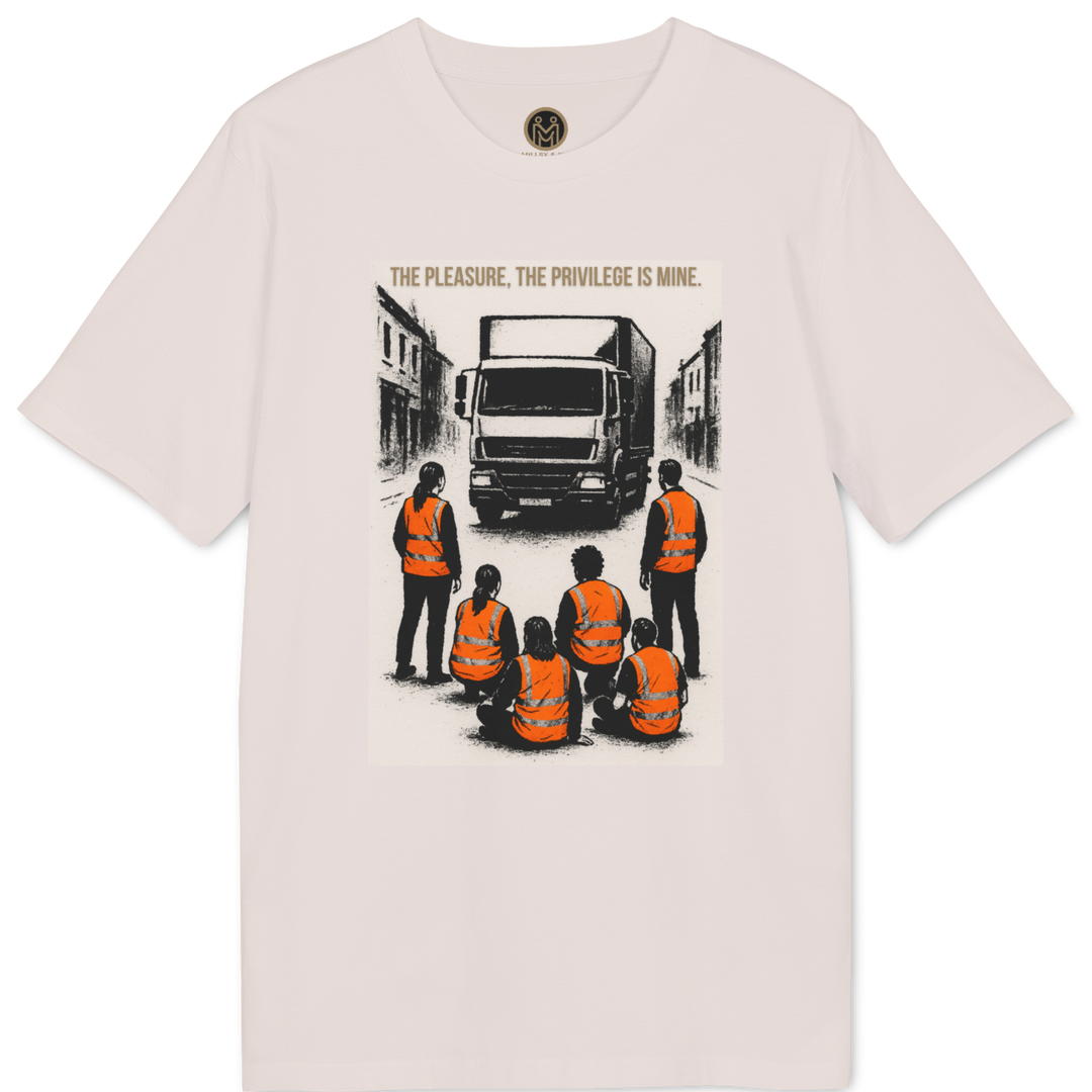 A light beige crewneck t-shirt featuring a graphic print of a delivery truck and workers in high-visibility orange vests on the front, with a small circular logo printed inside the collar.
