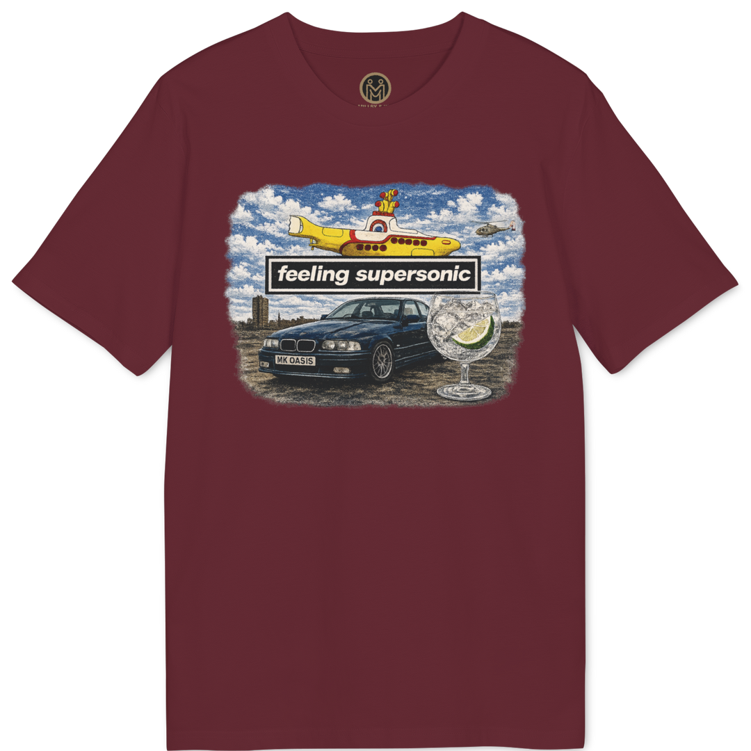 A maroon short-sleeve crewneck t-shirt featuring a colorful graphic print on the chest with a car, a yellow airplane, and the text &