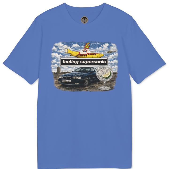 A blue short-sleeve crewneck t-shirt featuring a colorful graphic print on the chest. The graphic depicts a yellow subterranean vehicle, a black car, a road sign reading &