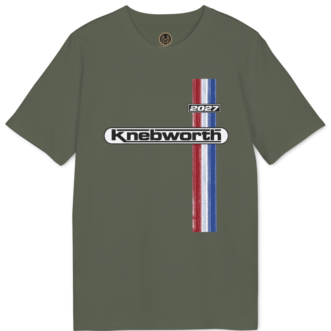 An olive green short-sleeve t-shirt with a front graphic featuring the text 'Knebworth 2027' and a vertical distressed stripe design in red, white, and blue.